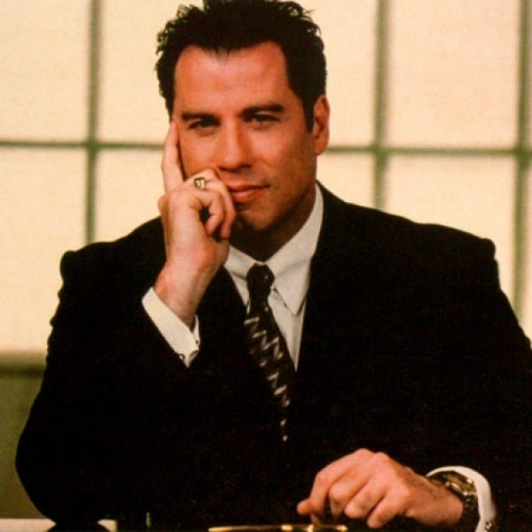John Travolta - americký herec který se hlásí k scientologii